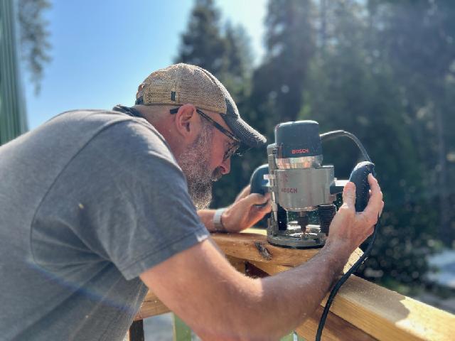 Ben working on a sign